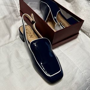 YDN brand navy and white shoes